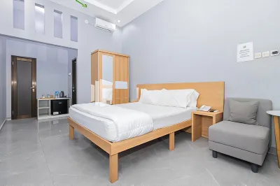 Villa Three King FM Mitra RedDoorz Hotel dekat TOKO BAROKAH H. JUHRI FOTOCOPY