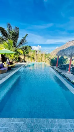 Canal Village Pakpra Phatthalung Отели рядом с достопримечательностью «Wat Pradu Riang School»