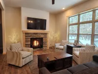 Spacious 5-BR home in Manitowish Waters with pier access on Chain of Lakes.