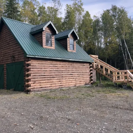 Charming cabin in wonderful New Sweden with 80 acres of woods and trails