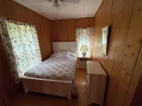 Charming cottage on Lake Willoughby w/ sun porch, private deck and dock.