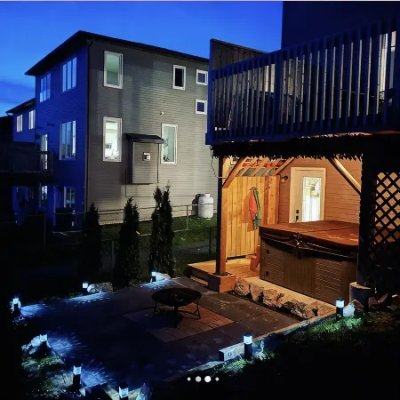 The Governor's Suite - An executive oasis featuring a hot tub, fire pit and BBQ!