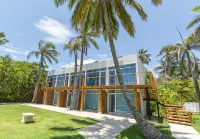 Award-Winning Beachfront VillaSleeps 28  • Full Staff • Pool Spa Private Beach