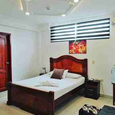 Hostal Perla Real Inn Rooms
