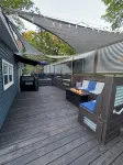 Spacious home near Torch Lake w/custom back patio, steps away from public access - 4-Star