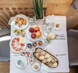 Villa Flora Mountain Lodges - servizio colazione