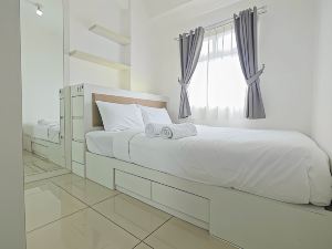 2BR at Green Pramuka Apartment with Mall Access By Travelio