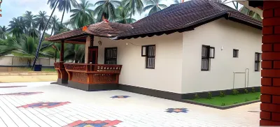Coastal Hideout Family Cottages - Malpe Beach