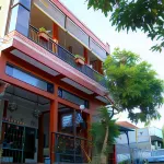 The Homey Rooms and Tours Hotel dekat Madad Sekumpul