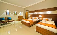 Bhasuri Inn Guruvayoor Hotels near Karumathil Bhagavathy Temple കരുമത്തിൽ ഭഗവതി ക്ഷേത്രം