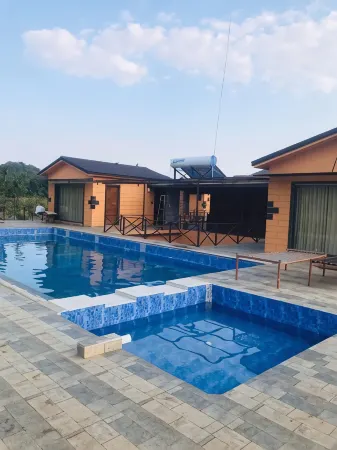 Whispering Woods Chalet Отели в г. Gir Somnath