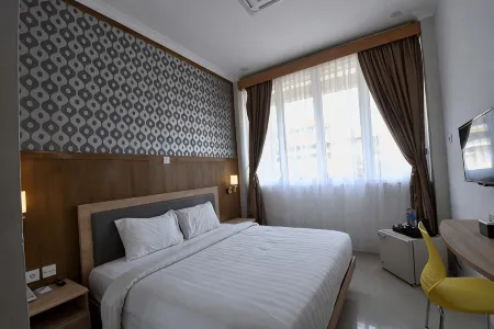 Monopoli Inn Отели в г. Guguk Panjang