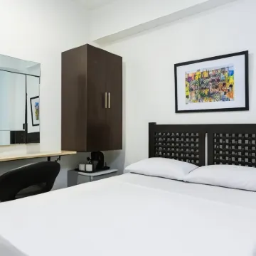 San Agustin Residences Hotels near Ayala Triangle Gardens