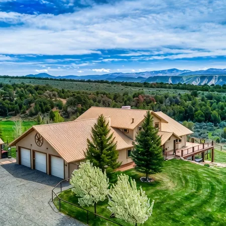 Quiet country getaway with STUNNING VIEWS, 4 bedrooms, 3 1/2 bath, large garage.