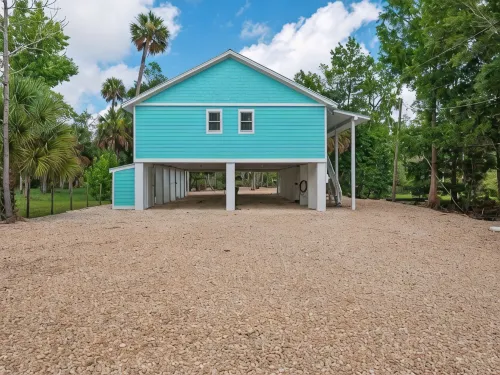 3-bedroom Riverfront home with private boat dock and view of Steinhatchee River.