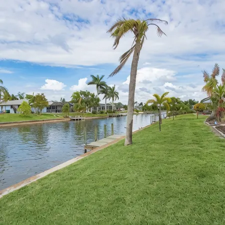 Waterfront Heated Pool Retreat with Dock Pet Friendly Sleeps 6 in Cape Coral