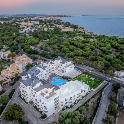 Santa Eulalia Hotel & Spa Hotels near Oura Beach