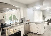 Beautiful Home in quiet neighborhood with a pool and close to stores & highways.