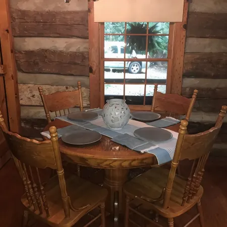 Come to the mountains to a rustic cabin by a creek.