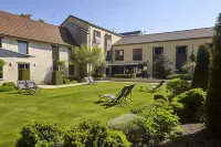 Maison d'Hôtes Les Herbes Folles Hôtels à proximité de : CELINE PARIS CDG TERMINAL 2E HALL K