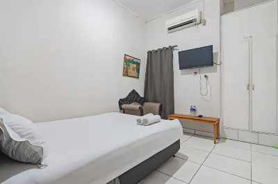Pemda 22 Mansion Mitra RedDoorz Hotel dekat RAMAYANA Plaza Jambu Dua