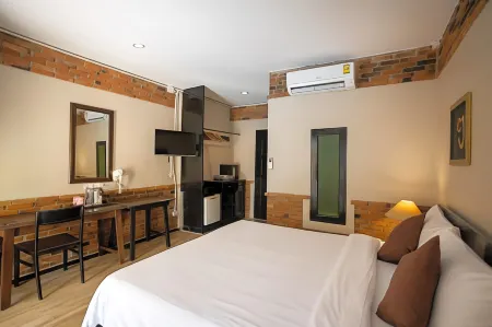 Motive Cottage Resort Отели рядом с достопримечательностью «Beyond Boxing Stadium - Bang Neang Khaolak»