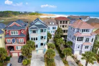 Steps to Beach Infinity Pool Hot Tub Game Room Coastal Marsh by AvantStay