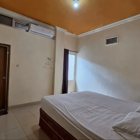 Rian Kost Kos Harian Penginapan Pusat Kota Palembang