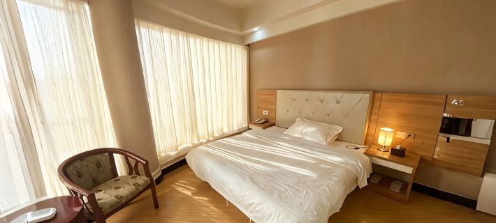 Bali Business Hotel, Xinxian Hotele w: Powiat Xin