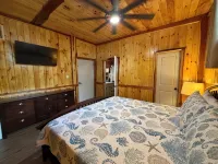 Waterfront Retreat with fenced yard, porch + bar, canal views, NEW DOCK - 3-Star
