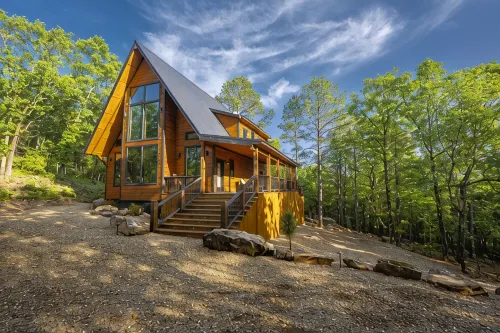 NEW! A Hidden Waterfall Oasis Is Tucked Behind This Luxury Broken Bow Cabin - Gym