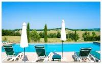 Tuscan village in SIena. farmhouse surrounded by garden,pool and panoramic view