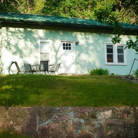 Remodeled home in the woods, just past city limits. With horse pasture nearby!