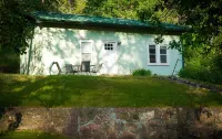 Remodeled home in the woods, just past city limits. With horse pasture nearby!