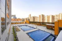 FabHotel Prime Spectrum Metro - with Pool |  5 Mins Walk from Sector 75 Metro - Pool