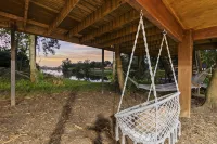 LUX Modern "Treehouse" on Private Lake - Gameroom, Kayaks, Bunkhouse, more!