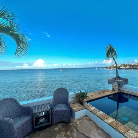Stunning waterfront, art deco family compound cascading to the water’s edge