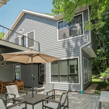 AMAZING NEWER HOME WITH LAKE VIEWS, steps away from shops and restaurants.