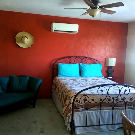 Secure carport, amazing Views and Reviews!  Private suite with patio.