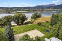 Stunning Lakefront Retreat with Jacuzzi and Unobstructed Mountain Views - 4-Star