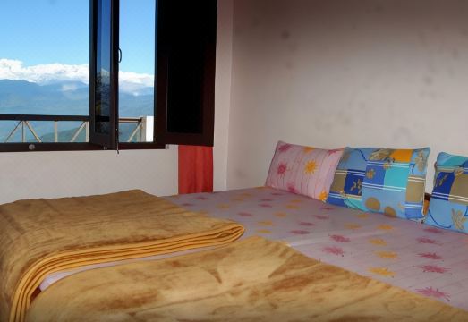 Goroomgo Snow View Guest House Kausani - Housity