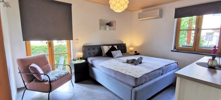 Modern Strata Montana vacation apartment with garden, underfloor heating and air conditioning Hoteles en Distrito de Bergstraße