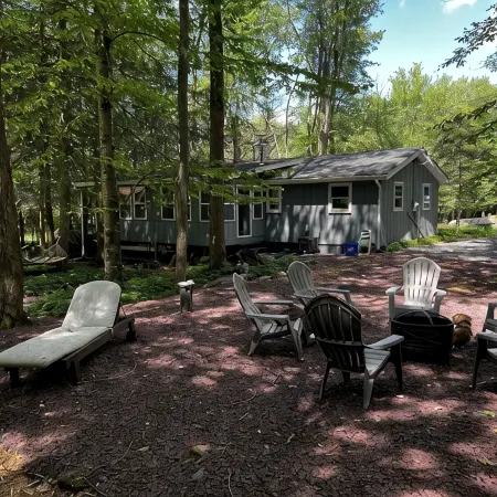 Romantic Pocono Lake Chalet: Firepit, Stream, near Lake, pools & Pet-Friendly