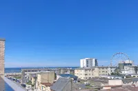 Roof top lighthouse and sea view
