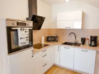 Modern and bright vacation apartment with Hutewald view Hotels in Vohl