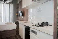 Good Designed and Cozy Studio at Sky House BSD Apartment By Travelio - 3-Star