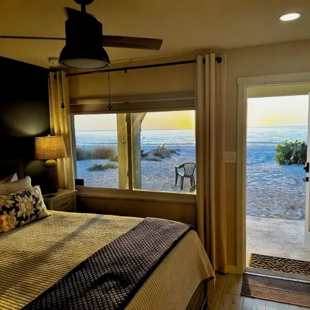 Totally Remodeled Beachfront Studio-Step out your door onto the sand. Really! D