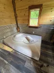 Tiny cabin sits by a bubbling, stocked creek. Pet friendly for a fee, hot tub - Chalets