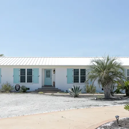 Beautiful Beach Home- 3 min walk to beach-Boat dock in back yard & private pool