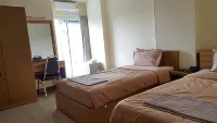 Good Morning Apartment Hotels near Wat Bua Luang